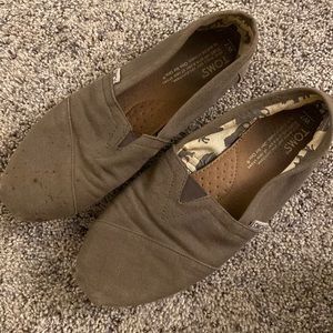 well loved gray TOMS shoes